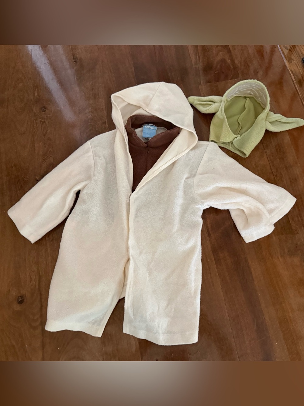 Infant sized Star Wars Yoda costume with hat costume runs big.